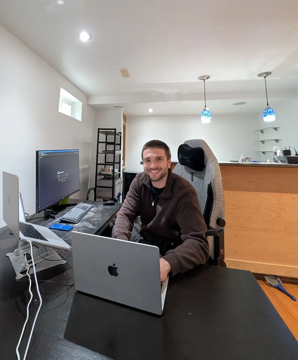 Ben Miller hard at work, coding games.